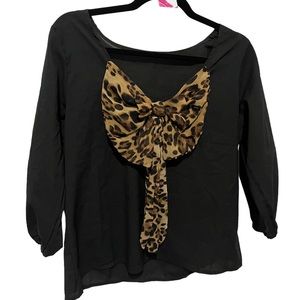 426 Cute black pullover blouse with leopard print bow at neckline. Size l